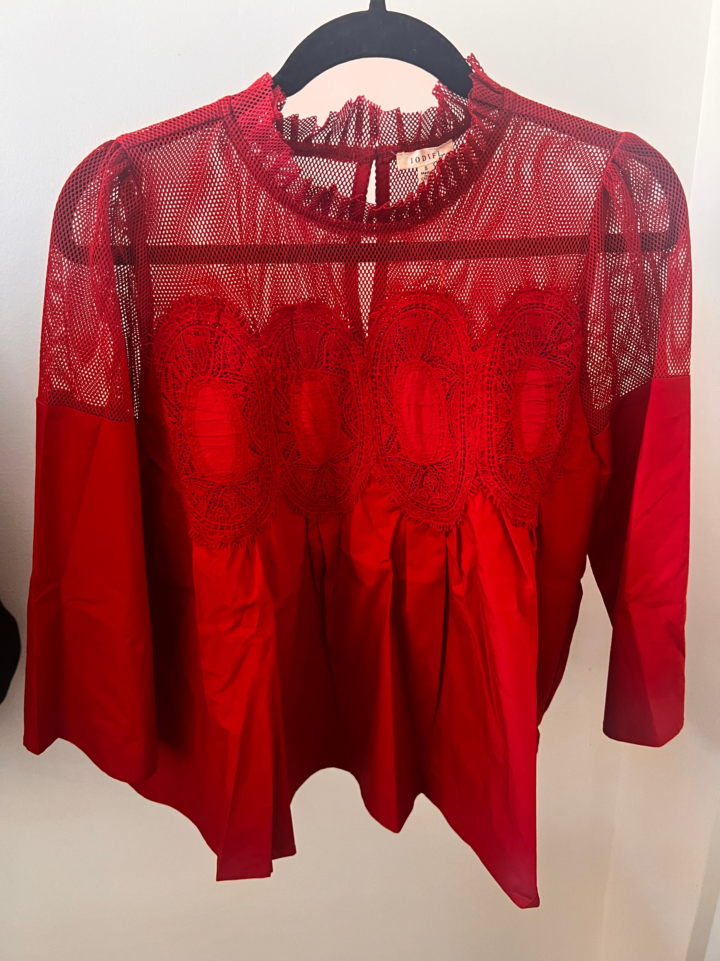 Berts Lace Peplum Top