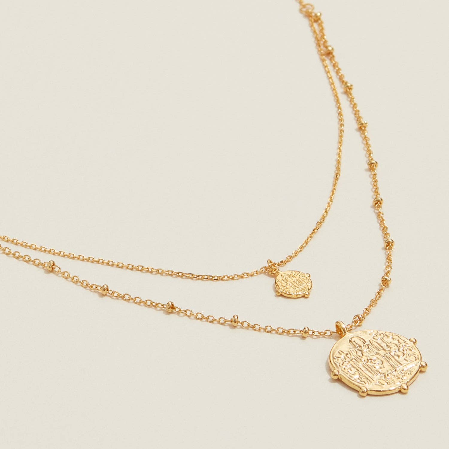 Hinn Layered Gold Necklace with Textured Coin Pendants
