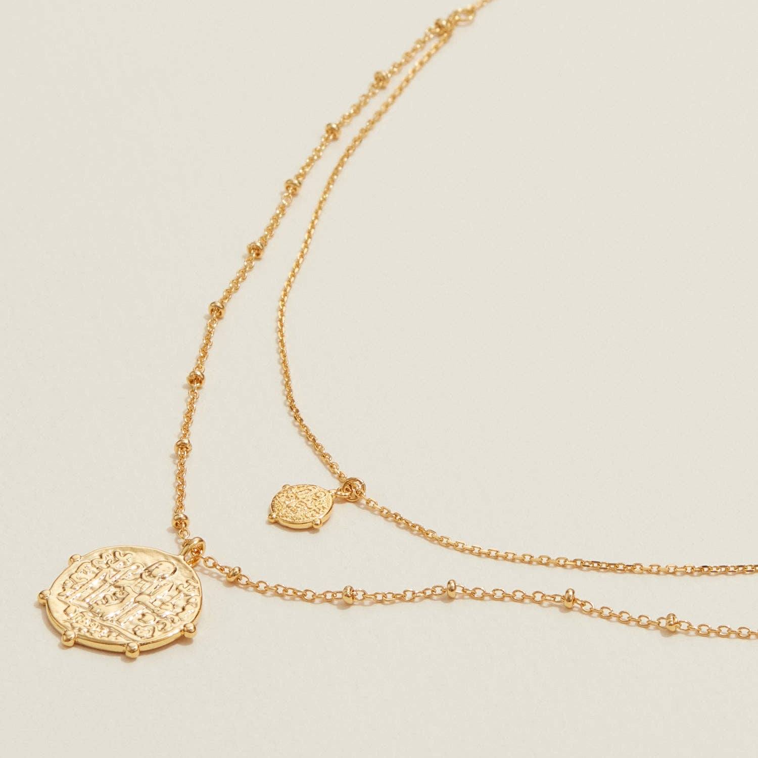 Hinn Layered Gold Necklace with Textured Coin Pendants